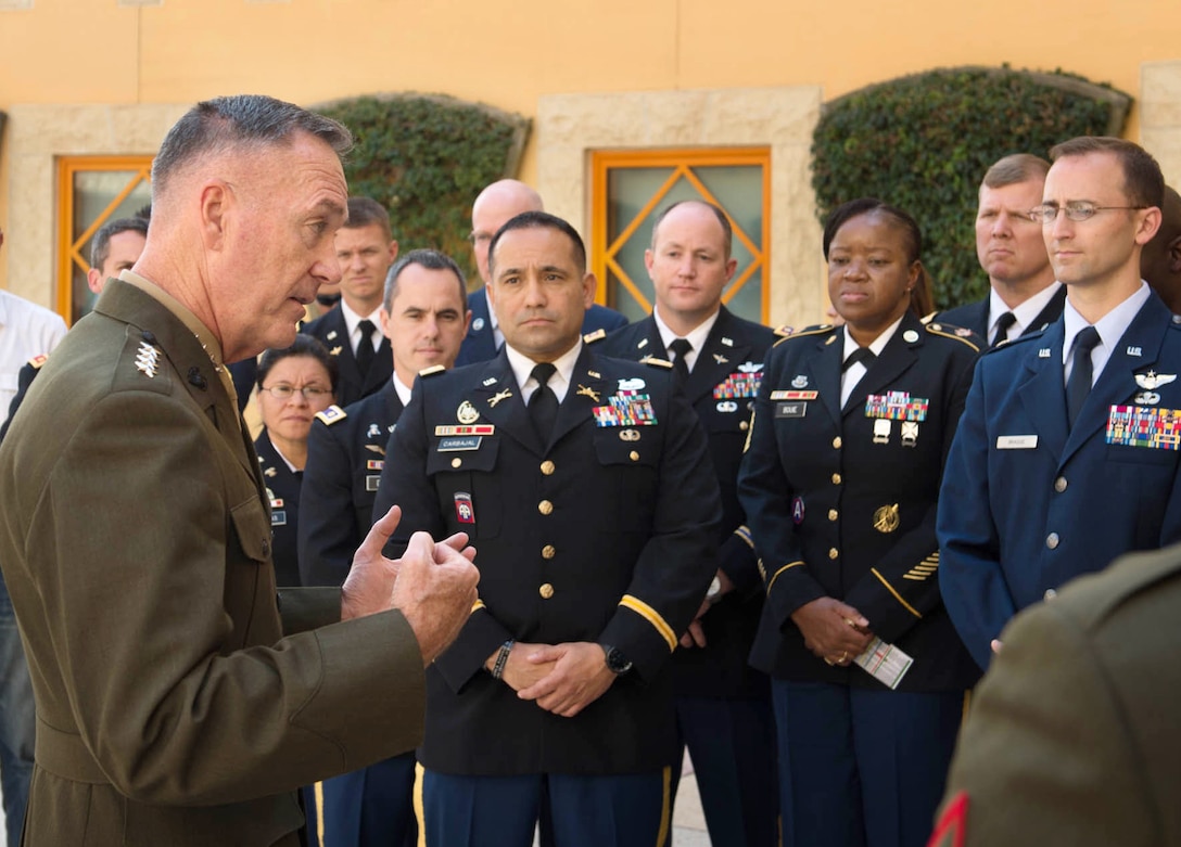 U.S. Marine Corps Gen. Joseph F. Dunford Jr., chairman of the Joint Chiefs of Staff, meets with U.S. service members assigned to the U.S. Embassy in Amman, Jordan, Oct. 19, 2015. DoD photo by D. Myles Cullen