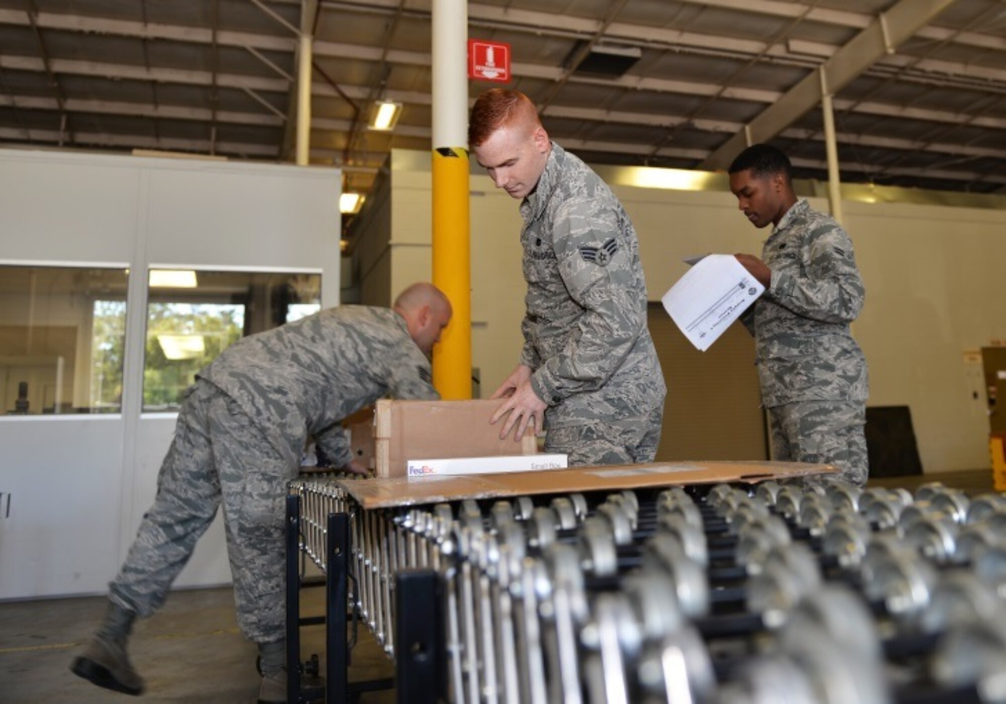 Airmen of the 96th Logistics Readiness Squadron process equipment and supplies for the F-35A and C variants for delivery at Eglin Air Force Base, Fla., Oct. 15, 2015. Materiel management Airmen prioritize equipment deliveries to help keep the 33rd Fighter Wing student pilots in the air and the 5th generation fighter moving forward to initial operational capabilities. (U.S. Air Force Photo/Senior Airman Andrea Posey)