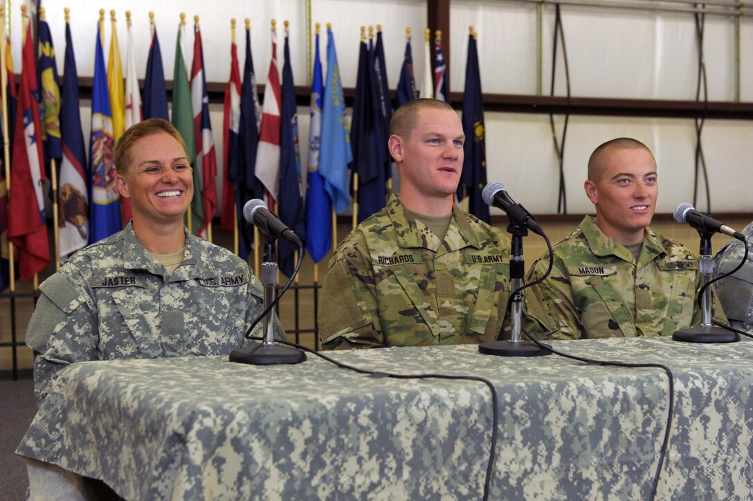 U.S. Army Maj. Lisa Jaster, left, along with fellow Ranger School graduates answer questions from the media prior to the Ranger School graduation ceremony on Fort Benning, Ga., Oct. 16, 2015. Jaster is an Army reservist and third female to graduate Ranger School. (U.S. Army photo by Staff Sgt. Alex Manne/Released)