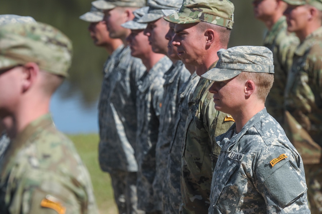 U.S. Army Maj. Lisa Jaster stands in formation during Ranger School graduation on Fort Benning, Ga., Oct. 16, 2015. Jaster is an Army reservist and the third woman to graduate Ranger School. (U.S. Army photo by Staff Sgt. Alex Manne/Released)