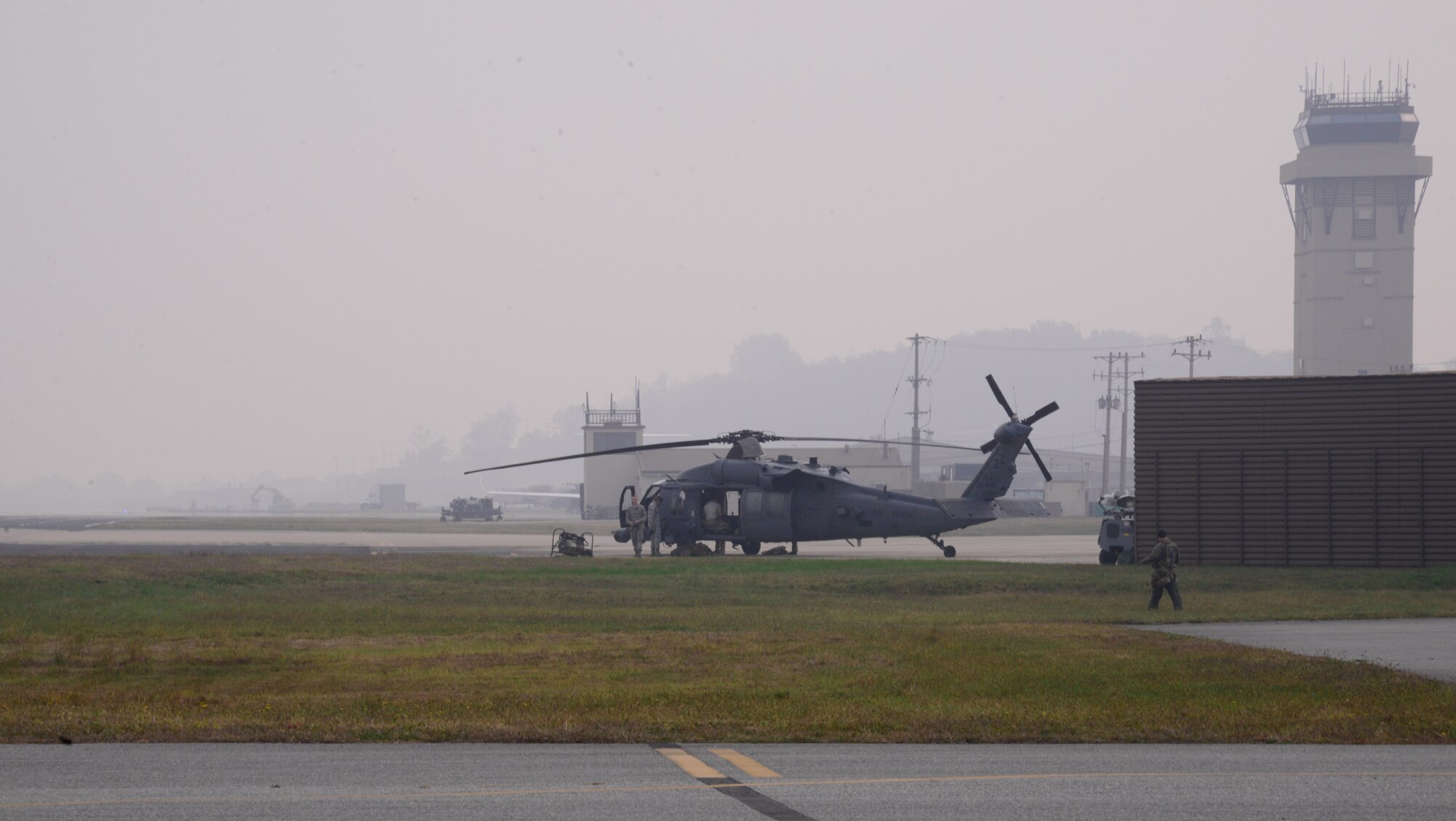 A U.S. Air Force HH-60 Pavehawk from the 33rd Rescue Squadron prepares for takeoff Oct. 16, 2015, at Osan Air Base, Republic of Korea. Members of the 33rd RQS are at Osan from Kadena Air Base, Japan, participating in exercise Pacific Thunder 15-02. The U.S. Air Force, Marines, and the ROK Air Force are working together participating in the joint, combined combat search and rescue exercise. (U.S. Air Force photo by Staff Sgt. Benjamin Sutton)