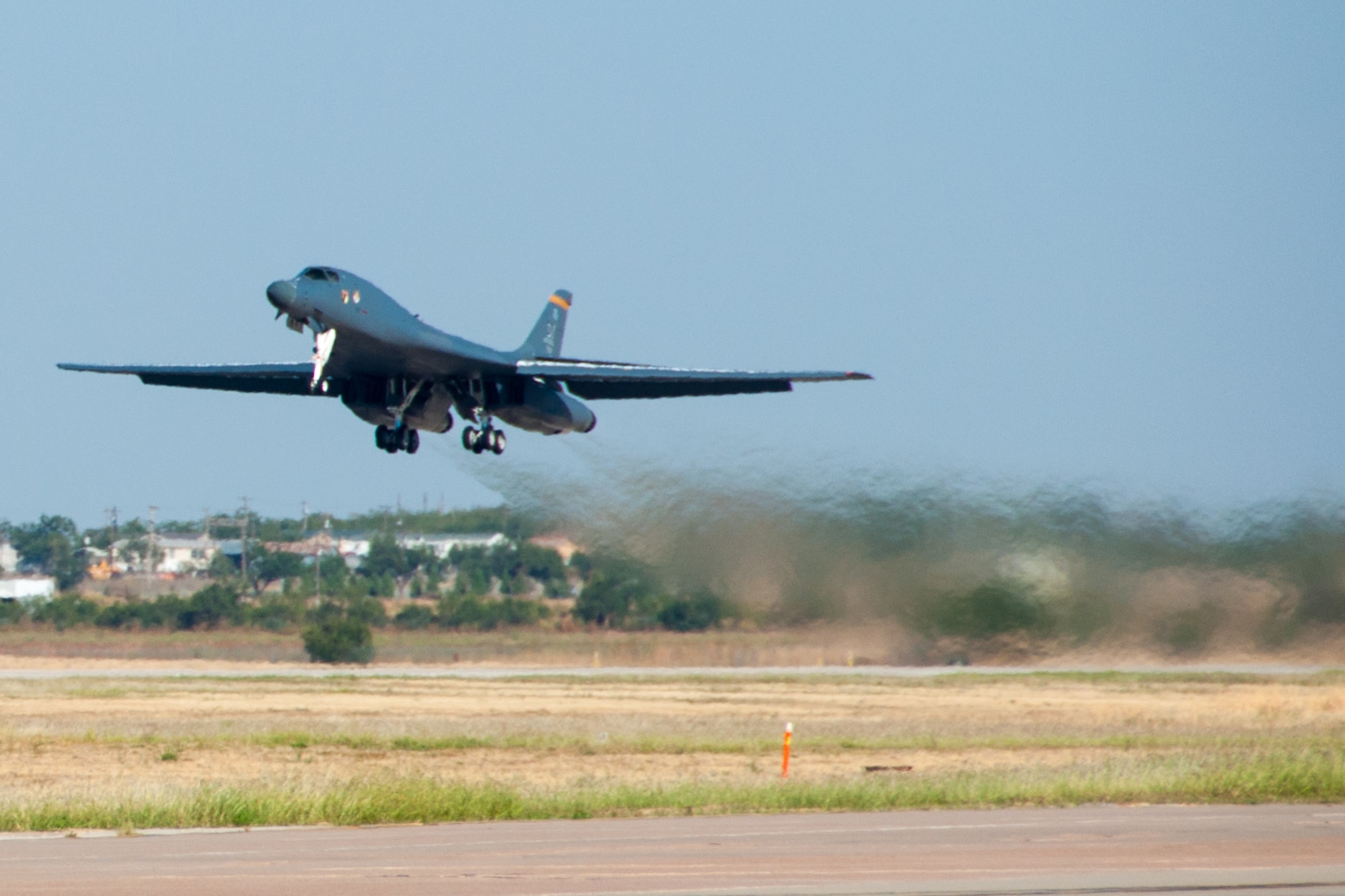 And she’s off! On Oct. 18, 2015, the flag ship of the 489th Bomb Group takes off on her first flight after the reactivation of the Bomb Group from Dyess Air Force Base in Texas. The aircraft is a B-1 Lancer that carries nose art dedicated to the POW/MIAs of America’s wars. The 489th Bomb Group, Dyess, Texas is assigned to the 307th Bomb Wing at Barksdale Air Force Base, La. (U.S. Air Force photo by Master Sgt. Laura Siebert/Released)
