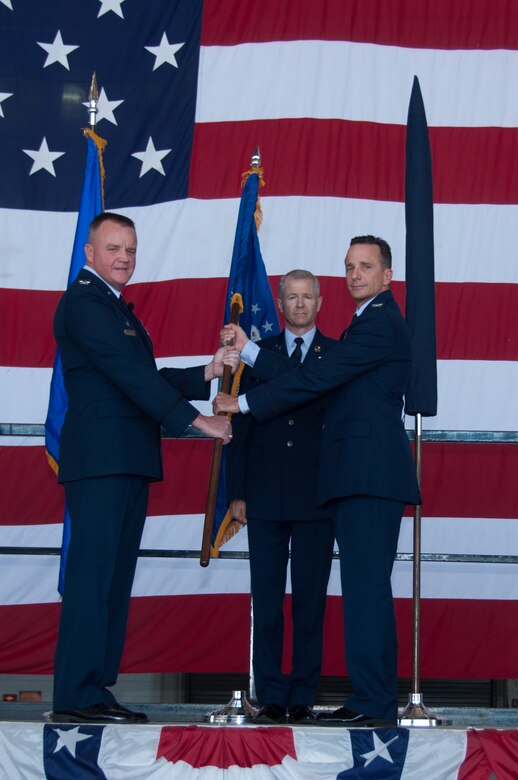U.S. Air Force Reserve Col Denis Heinz (right), assumes command of the 489th Bomb Group during a ceremony on Oct. 17, 2015, Dyess Air Force Base, Texas. The 489th was reactivated exactly 70 years after it was inactivated on Oct. 17, 1945. It will operate out of Dyess Air Force Base near Abilene, Texas flying the B-1 bomber as an associate unit of the 7th Bomb Wing. The 489th is assigned to the 307th Bomb Wing at Barksdale Air Force Base, La.   (U.S. Air Force photo by Master Sgt. Laura Siebert/Released)