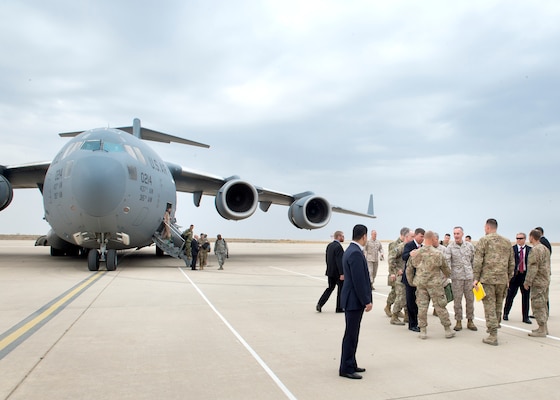 U.S. Ambassador to Iraq Stuart E. Jones and U.S. Army Lt. Gen. Sean McFarland greet U.S. Marine Corps Gen. Joseph F. Dunford Jr., chairman of the Joint Chiefs of Staff, upon his arrival in Irbil, Iraq, Oct. 20, 2015. DoD photo by D. Myles Cullen