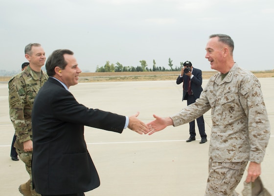 U.S. Ambassador to Iraq Stuart E. Jones greets U.S. Marine Corps Gen. Joseph F. Dunford Jr., chairman of the Joint Chiefs of Staff, upon his arrival in Irbil, Iraq, Oct. 20, 2015. DoD photo by D. Myles Cullen
