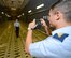 Cadets take pictures of each other inside the cargo compartment of a C-5M Super Galaxy during a tour hosted by the 436th Airlift Wing Oct. 15, 2015, at Dover Air Force Base, Del. The cadets were able to see a C-5M and C-17A Globemaster III and interact with the aircrews as they learned about the airlift mission within the Air Force. (U.S. Air Force photo/Greg L. Davis)