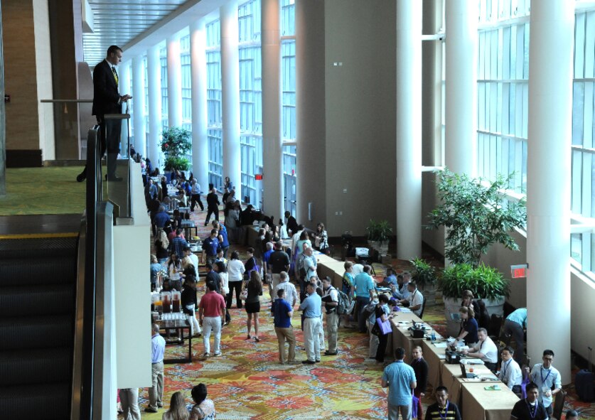 A security team member monitors a crowd of attendees at an Air Force Reserve Yellow Ribbon Reintegration Program training event in Orlando, Fla., Sept. 27, 2015. An eight-person security detail, including members of the 459th Security Forces Squadron, provided security for the event, which had 900 participants. Yellow Ribbon promotes the well-being of reservists and their families by connecting them with resources before and after deployments. (U.S. Air Force photo by Staff Sgt. Matthew Burke