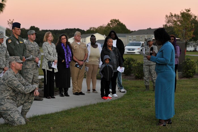 Dr. Karen Simmons shares her story of domestic violence during a candlelight vigil ceremony at Joint Base Charleston, S.C., Oct. 19, 2015. The ceremony included lighting of candles, eight victims’ stories and a balloon release. (U.S. Air Force photo/Tech. Sgt. Renae Pittman) 