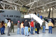Attendees of the Midair Collision Avoidance seminar take a tour through a KC-135 Stratotanker static display Oct. 17, 2015, at McConnell Air Force Base, Kan. Approximately 100 members of the local flying community visited the base to learn about flight safety as part of the MACA event. (U.S. Air Force photo by Airman 1st Class Tara Fadenrecht)