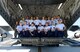 Latin American cadets are joined by C-17A Globemaster III loadmasters from the 3d Airlift Squadron on the cargo ramp of the aircraft during a tour hosted by the 436th Airlift Wing Oct. 15, 2015, at Dover Air Force Base, Del. The Latin American Cadet Initiative program brought cadets from 13 Central and South American countries to see first-hand how the Air Force conducts airlift during their visit to Team Dover. (U.S. Air Force photo/Greg L. Davis)