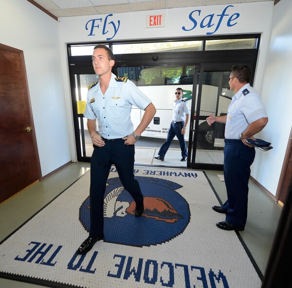 Cadets arrive at the 9th Airlift Squadron for a mission capabilities briefing at the start of a tour hosted by the 436th Airlift Wing Oct. 15, 2015, at Dover Air Force Base, Del. The visiting cadets came from 13 Latin American countries as part of the Latin American Cadet Initiative program run through the Secretary of the Air Force’s International Affairs office. (U.S. Air Force photo/Greg L. Davis)