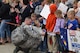 Master Sgt. Lucas Roorda, 114th Maintenance Group aircraft armament system mechanic, is one of the almost 250 members of the South Dakota Air National Guard welcomed home to Joe Foss Field, S.D. Sep. 18, 2015.  The members returned from a four-month tour in support of the Pacific Command (PACOM) Theater Security Package (TSP). (U.S. Air National Guard photo by Staff Sgt. Luke Olson/Released) 