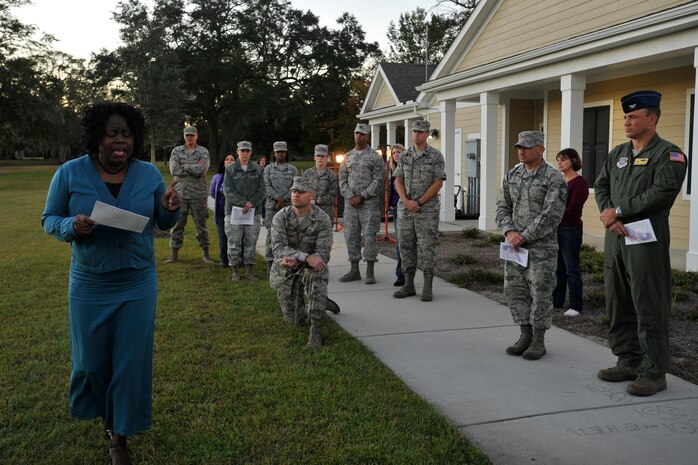 Dr. Karen Simmons shares her story of domestic violence during a candlelight vigil ceremony at Joint Base Charleston, S.C., Oct. 19, 2015. The ceremony included lighting of candles, eight victims’ stories and a balloon release. (U.S. Air Force photo/Tech. Sgt. Renae Pittman)