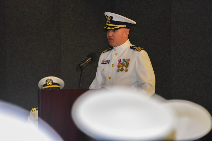Cmdr. Michael J. Paradise, the commanding officer of Coast Guard Base Charleston, S.C., addresses guests during the base establishment ceremony at the Federal Law Enforcement Training Center in Charleston Oct. 19, 2015. CG Base Charleston was established to integrate mission support activity and align logistics in the northern areas of the 7th Coast Guard District. (U.S. Coast Guard photo by Petty Officer 2nd Class Anthony L. Soto)
