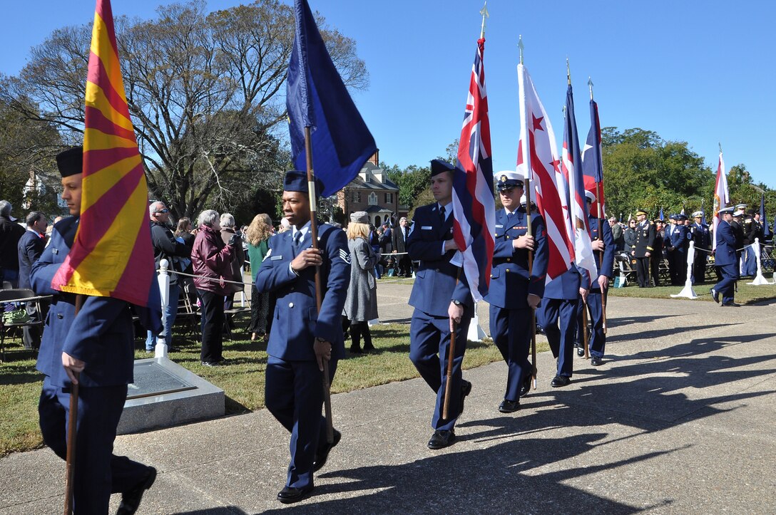 U.S. Air Force Airmen from Langley Air Force Base, Va., carry flags alongside U.S. Service members from other military branches of service during a patriotic flag ceremony during Yorktown Day in Yorktown, Va., Oct. 19, 2015. The modern Yorktown Day observance started in 1922, when the Daughters of the American Revolution began an annual wreath-laying ceremony, which set the tradition for the current observances. (U.S. Air Force photo by Master Sgt. April Wickes/Released)