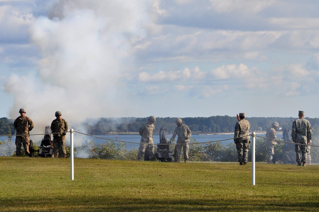 U.S. Army Soldiers from the 7th Transportation Brigade (Expeditionary) fire cannons to signal the start of the annual Yorktown Day parade in Yorktown, Va., Oct. 19, 2015. The cannons were fired a total of 13 times to signify the 13 original American colonies. (U.S. Air Force photo by Master Sgt. April Wickes/Released) 