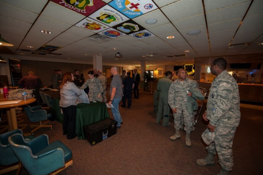 Minot personnel gather at the winter safety expo at Minot Air Force Base, N.D., Oct. 14, 2015. Minot held a winter safety expo to help educate Minot personnel for the upcoming winter. (U.S. Air Force photo/Airman 1st Class Christian Sullivan)