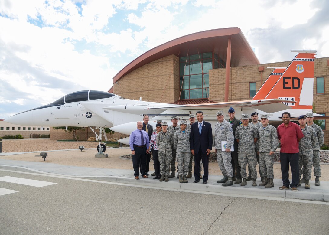 California Secretary of State Alex Padilla along with unit voting representatives pose for a group photo at Base Operations Oct. 16. Padilla visited Edwards to encourage military members to vote and learn about issues effecting their local community. (U.S. Air Force photo by Rebecca Amber)