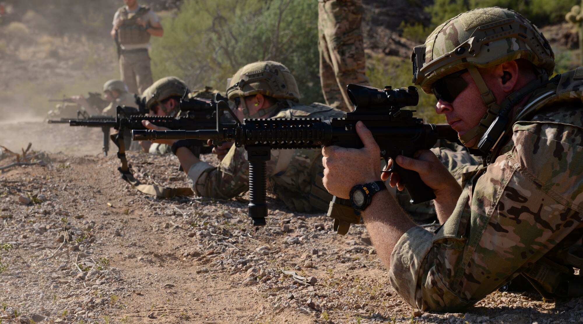 EOD Airmen practice marksmanship at the firing range. Training at the Barry M. Goldwater Range provides EOD teams the opportunity to practice their skills without being deployed. (U.S. Air Force photo by Airman 1st Class Ridge Shan)