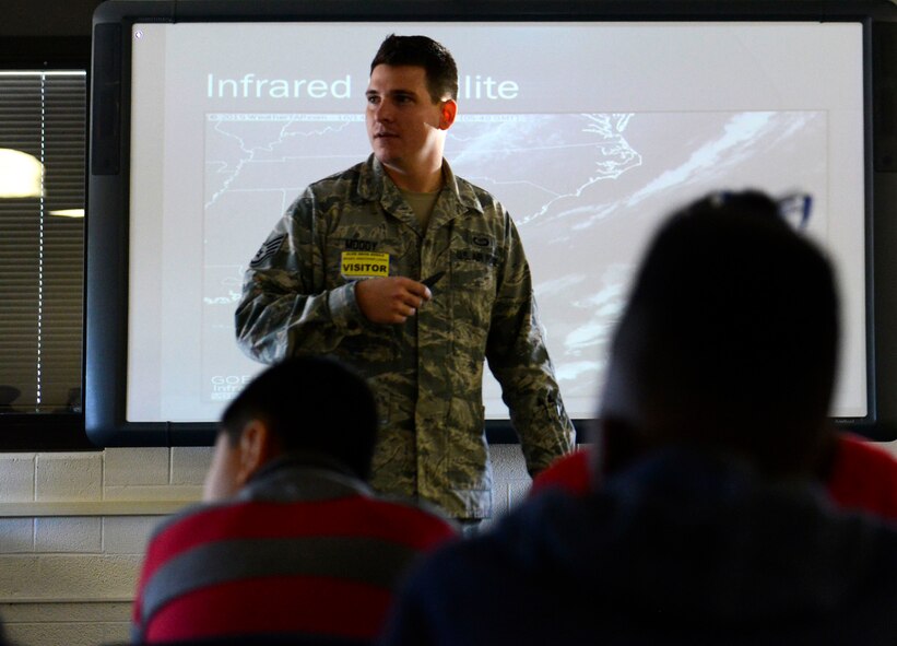 U.S. Air Force Staff Sgt. Kristofer Moody, 20th Operation Support Squadron weather forecaster, briefs students at Alice Drive Middle School, Sumter S.C., Oct. 15, 2015.  The 20th OSS weather flight set up a two-day event where they taught more than 350 students about types of weather and how it affects the mission of the 20th Fighter Wing. (U.S. Air Force photo by Airman 1st Class Christopher Maldonado/Released)