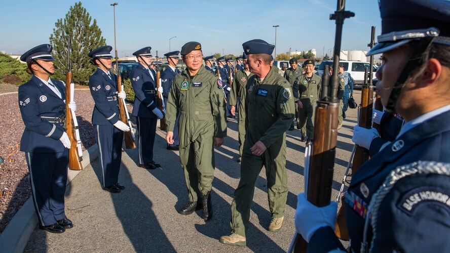 The Republic of Singapore Chief of the Air Force Maj. Gen. Hoo Cher Mou and 366th Fighter Wing Commander Col. David Iverson arrive at the 428th Fighter Squadron at Mountain Home Air Force Base, Idaho, Oct, 14, 2015. The 428th FS was re-activated in 2009 as part of the Peace Carvin V agreement between the U.S. Air Force and the Republic of Singapore Air Force. (U.S. Air Force photo by Airman 1st Class Connor J. Marth/RELEASED)