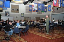 Col. Albert Miller, 22nd Air Refueling Wing commander, welcomes attendees to the Midair Collision Avoidance seminar Oct. 17, 2015, at McConnell Air Force Base, Kan. The MACA event included briefings from the McConnell safety office, base leadership and a KC-135 Stratotanker static display. (U.S. Air Force photos by Airman 1st Class Tara Fadenrecht)