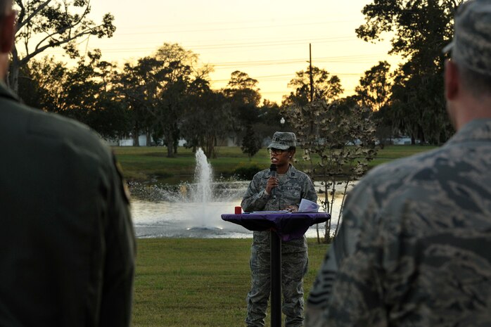 Capt. Sheontee Frank, 628th Medical Group Family Advocacy officer, provides opening remarks for this year's domestic violence candlelight vigil at Joint Base Charleston, S.C., Oct. 19, 2015. The ceremony was held in remembrance of all those who have been affected by domestic violence. (U.S. Air Force photo/Tech. Sgt. Renae Pittman)