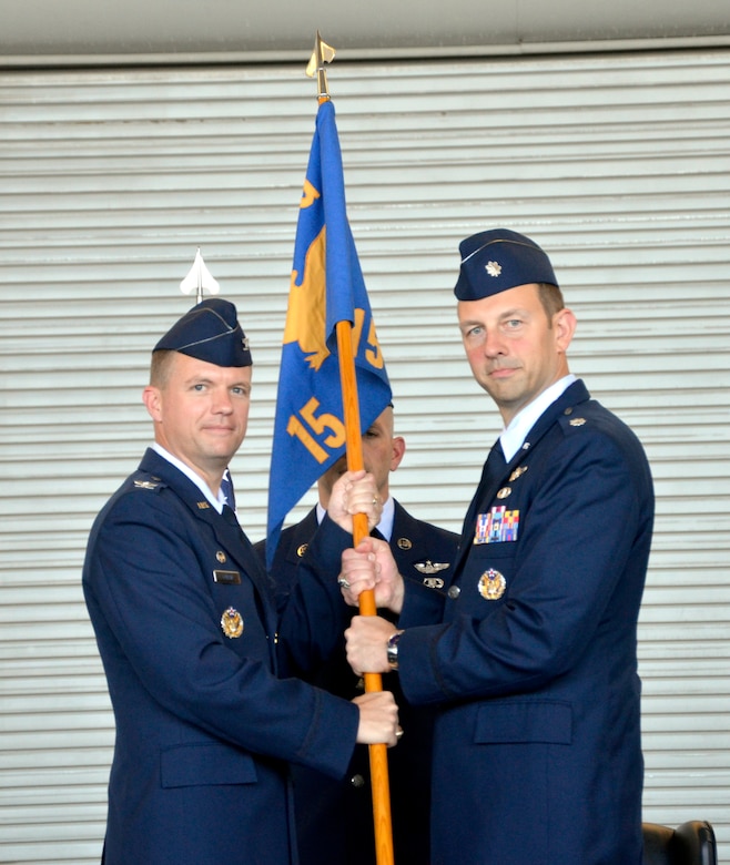 Lt Col. Eric Bucheit (right) assumes command of the 15th Airlift Squadron from Col. Scoville Currin during a change of command ceremony at Joint Base Charleston – Air Base, S.C., on Oct. 15, 2015. Lt Col. Bucheit hails from Erie, Pennsylvania and is the former 16th Airlift Squadron director of operations. (U.S. Air Force photo/ 2nd Lt. Michael Sattes)