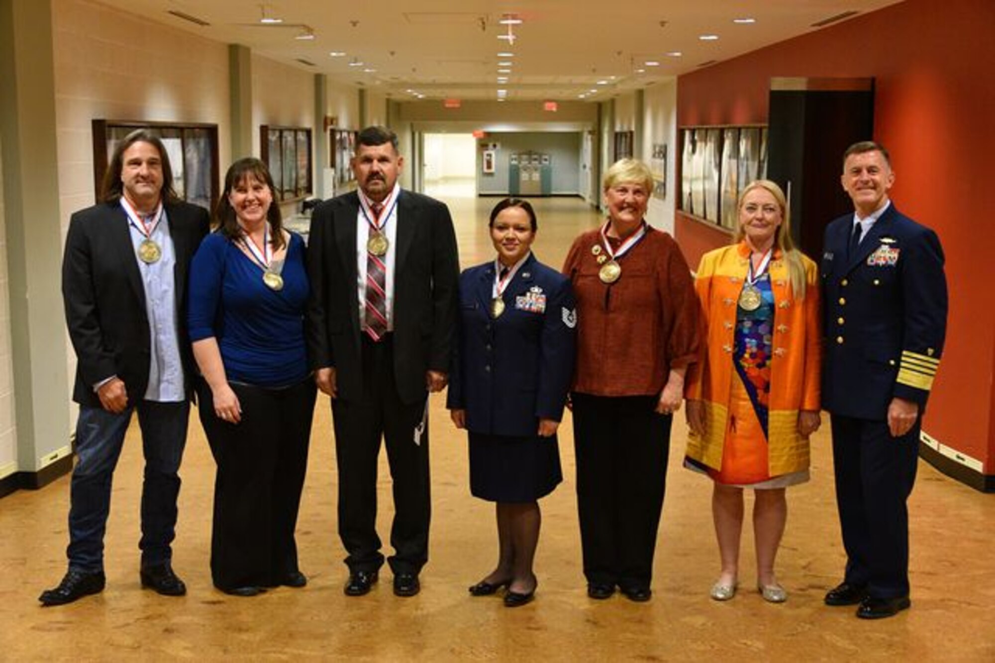The recipients of the 2015 Department of Defense Spirit of Hope Award pose for a photo with Coast Guard Commandant Adm. Paul F. Zukunft, right, who presided over the award ceremony at the Pentagon, Oct. 16, 2015. Left to right, the recipients are a representative who accepted the award for country music star Toby Keith, nominated by the Office of the Secretary of Defense and the Joint Staff; Dana Hinesly, nominated by the Army; a representative of the Quantico Injured Military Sportsmen Association, nominated by the Marine Corps; Air Force Tech. Sgt. Rebecca Martin, nominated by the Air Force; Sandra Lehmkuhler, nominated by the Navy; Suzanne Maas, nominated by the Coast Guard; and Zukunft. (U.S. Coast Guard photo by Petty Officer 2nd Class Patrick Kelley)
