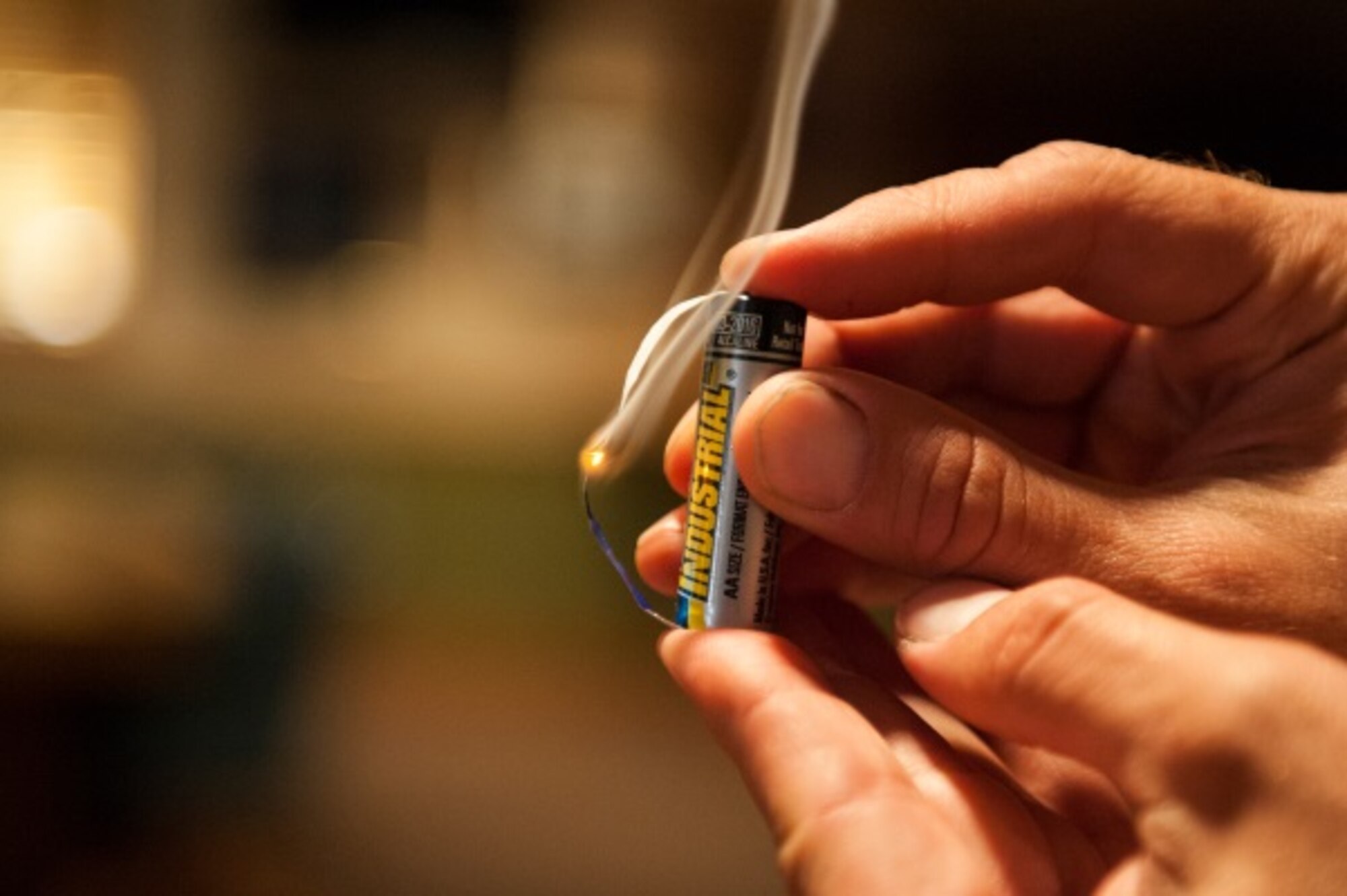 Tech. Sgt. Scott Herbert, 5th Civil Engineer Squadron assistant chief of health and safety, shows an exhibit on fire safety at Minot Air Force Base, N.D., Oct. 14, 2015. Minot held a winter safety expo to help educate Minot personnel for the upcoming winter. (U.S. Air Force photo/Airman 1st Class Christian Sullivan)