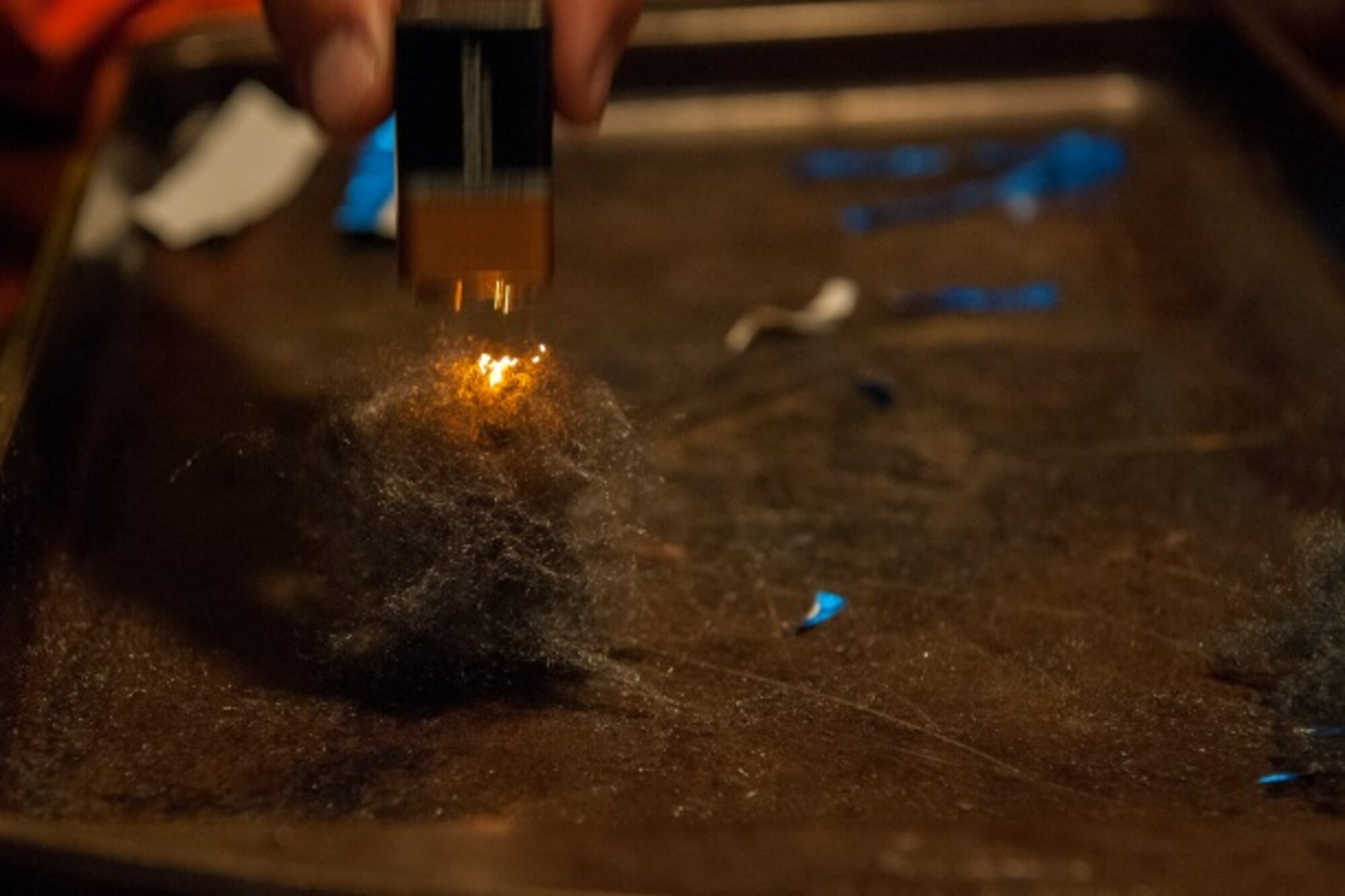 Tech. Sgt. Scott Herbert, 5th Civil Engineer Squadron assistant chief of health and safety, shows an exhibit on fire safety at Minot Air Force Base, N.D., Oct. 14, 2015. Minot held a winter safety expo to help educate Minot personnel for the upcoming winter. (U.S. Air Force photo/Airman 1st Class Christian Sullivan)