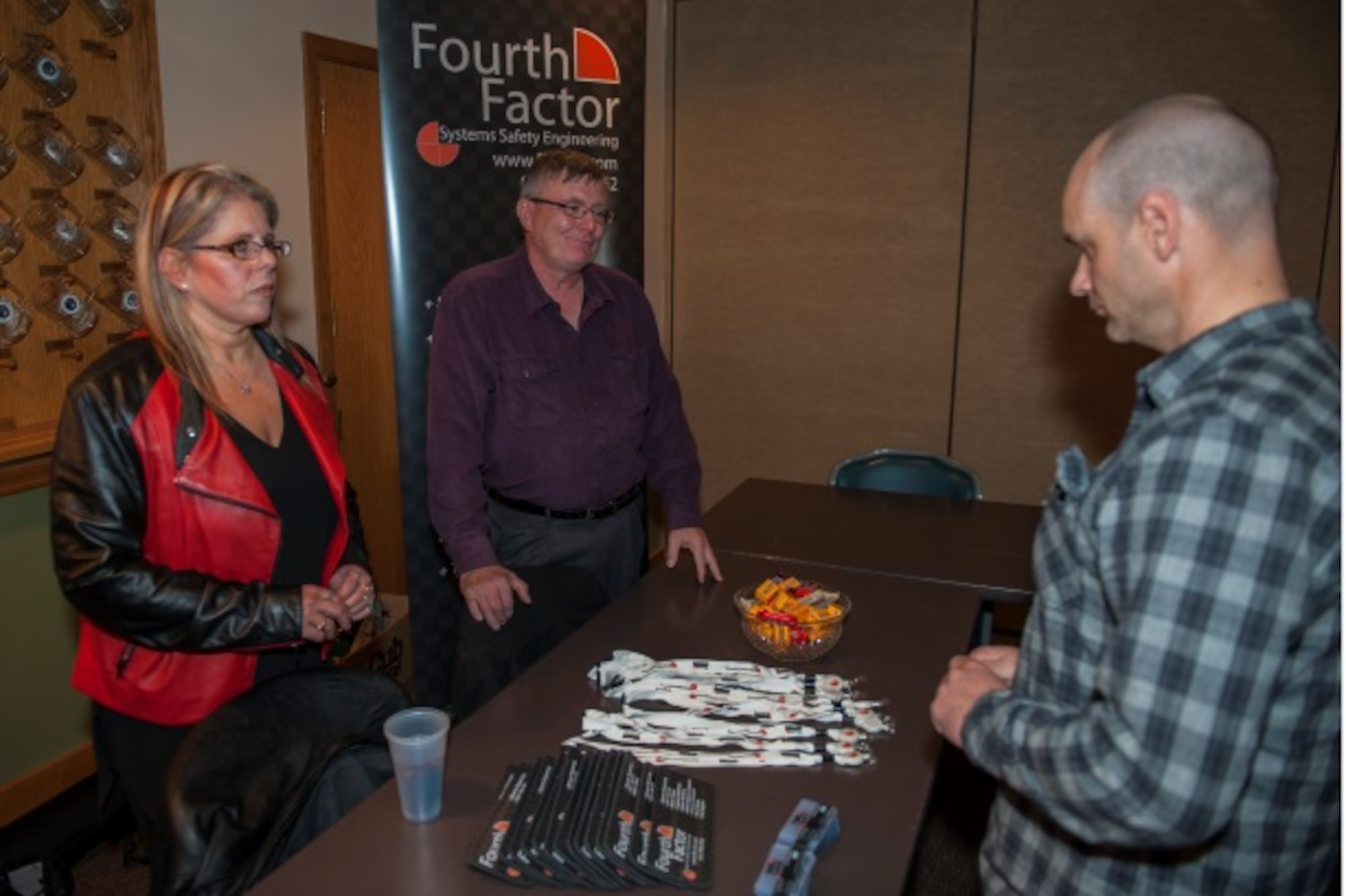 A Minot member looks at items Fourth Factor Engineering had to offer while they taught about safety for winter at Minot Air Force Base, N.D., Oct. 14, 2015. Minot held a winter safety expo to help educate Minot personnel for the upcoming winter. (U.S. Air Force photo/Airman 1st Class Christian Sullivan)