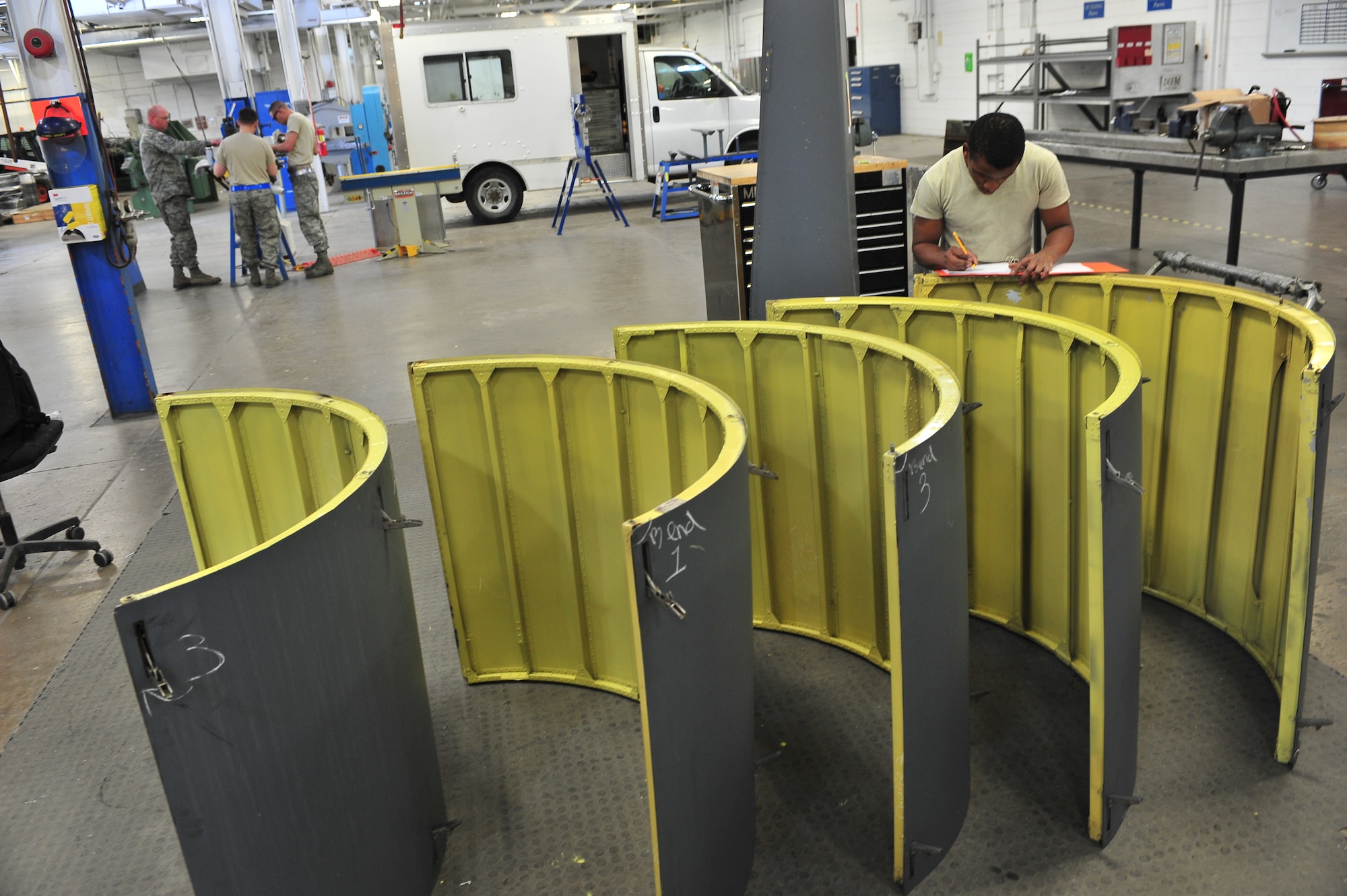 Airmen 1st Class Gerarl Johnson, 5th Maintenance Squadron aircraft structural maintenance apprentice, logs areas that need repair on B-52H Stratofortress parts at Minot Air Force Base, N.D., Oct. 14, 2015. Airmen like Johnson support operations of both the 5th Bomb Wing and 91st Missile Wing. (U.S. Air Force photo/Senior Airman Stephanie Morris)