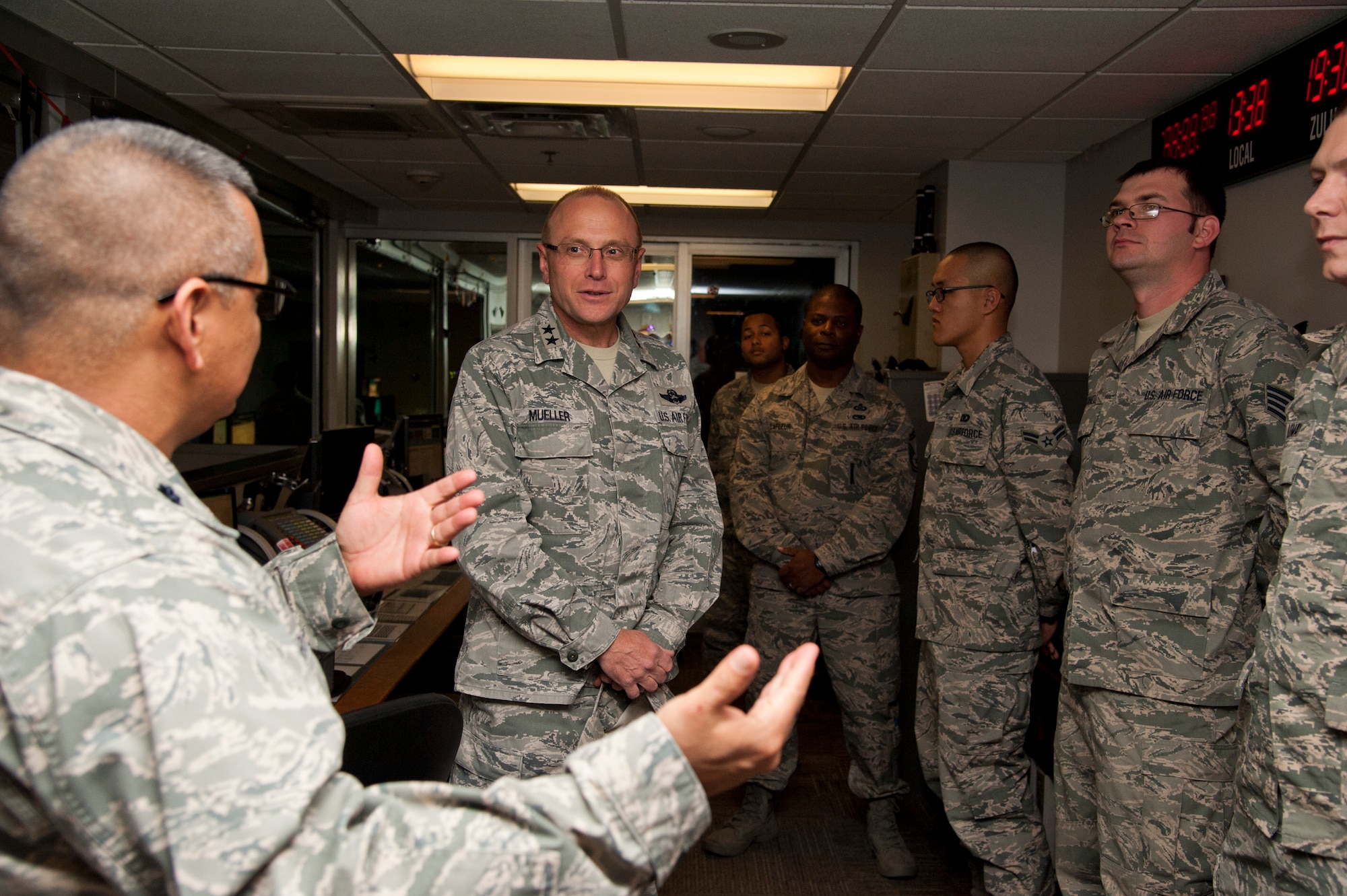 PETERSON AIR FORCE BASE, Colo. –Maj. Gen. Andrew Mueller, Headquarters U.S. Air Force chief of safety and Air Force Safety Center commander, visits with Airmen at the Pikes Peak Regional Command Post, Oct. 13, 2015. Mueller visited Airmen in their work centers at Headquarter Air Force Space Command and the 21st Space Wing as his first stop on a tour of all the major commands and their installations as the new chief of safety. (U.S. Air Force photo by Senior Airman Tiffany DeNault)