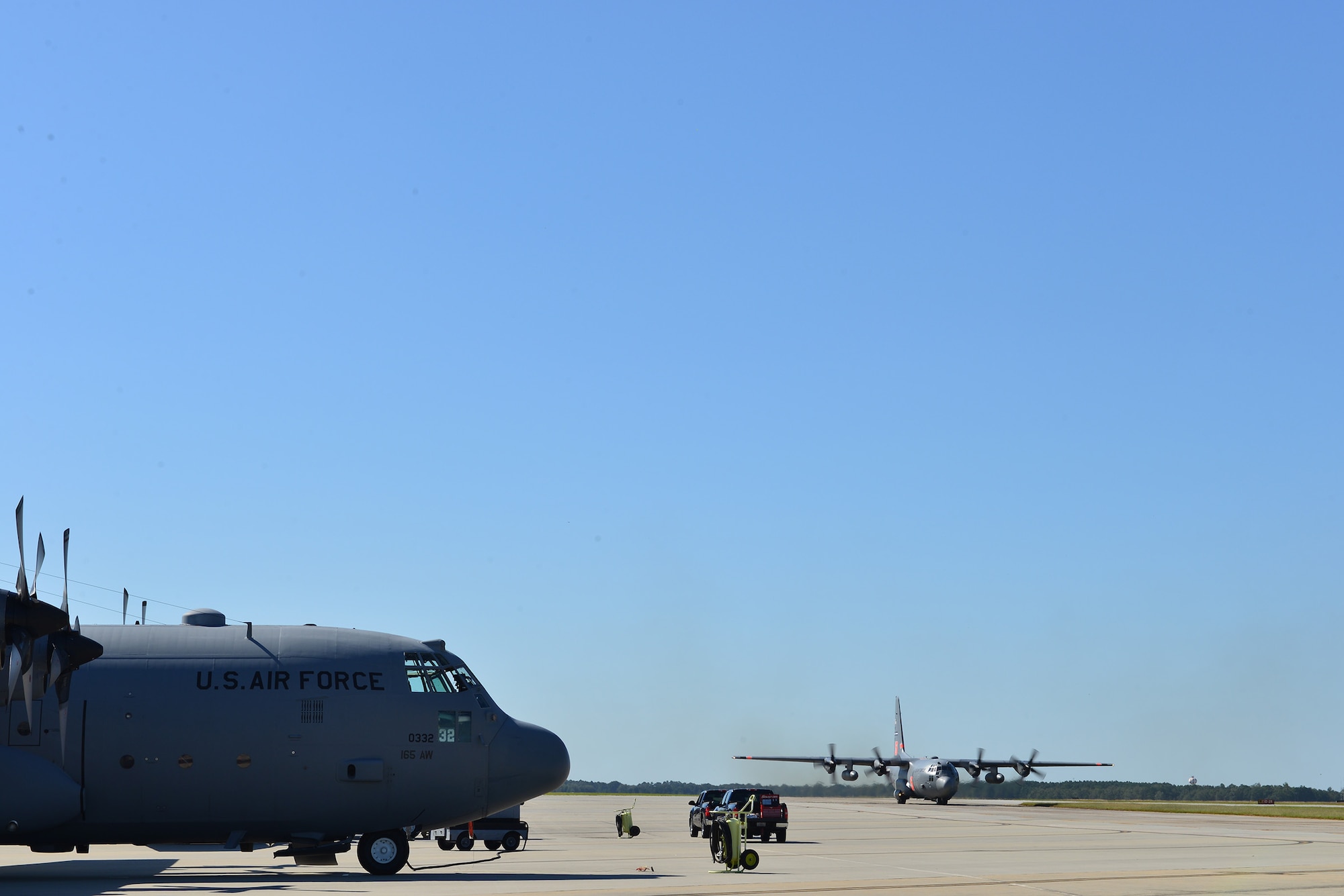 U.S. Air Force C-130H3 Hercules lands on the runway at the 165th Airlift Wing, Savannah, Ga. Oct. 15, 2015. The 165th Airlift Wing received the first of eight aircraft upgrades expected to take place through 2016. The upgrades will better allow the Georgia Air National Guard unit to support State, Federal, and worldwide contingencies. (Air National Guard photo by Tech. Sgt. Amber Williams/Released)