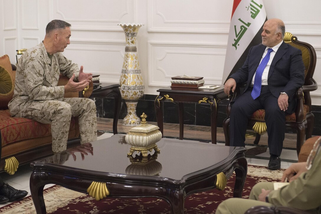 U.S. Marine Corps Gen. Joseph F. Dunford Jr., chairman of the Joint Chiefs of Staff, meets with Prime Minister of Iraq, Haider  al-Abadi, in Baghdad, Iraq, Oct. 20, 2015. DoD photo by D. Myles Cullen
