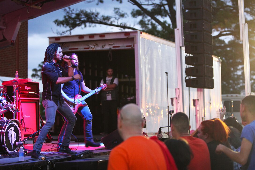 The band First Decree entertains a group of service members and families at the 2015 Rocktoberfest at Marine Corps Air Station Cherry Point, N.C., Oct. 16, 2015. The festival featured the rock bands: Switchfoot, Devour the Day and First Decree. (U.S. Marine Corps photo by Pfc. Nicholas P. Baird/ Released)
