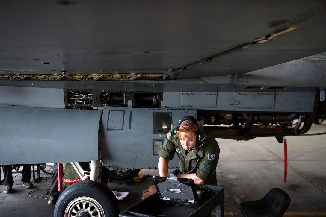 U.S. Air Force Staff Sgt. Matthew Lawson works to complete a 400-hour phase inspection on an F-16 Fighting Falcon aircraft at Bagram Airfield, Afghanistan, Oct. 18, 2015. Lawson is assigned to the 455th Expeditionary Maintenance Squadron. U.S. Air Force photo by Tech. Sgt. Joseph Swafford