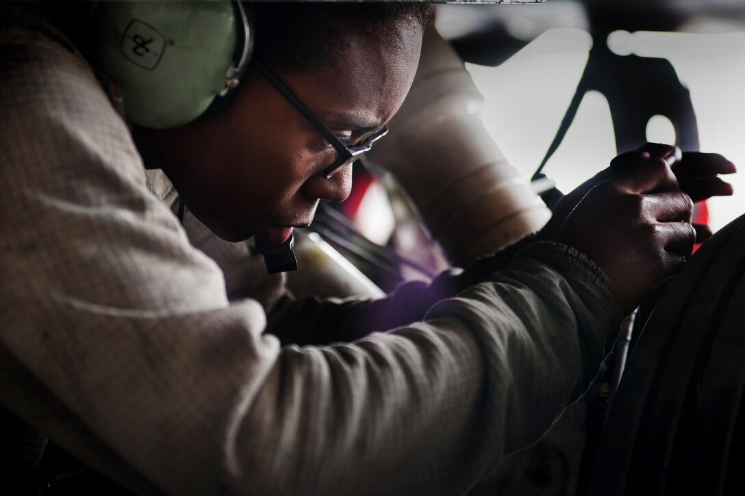 U.S. Air Force Senior Airman Kristina Manning works to complete a 400-hour phase inspection on an F-16 Fighting Falcon aircraft at Bagram Airfield, Afghanistan, Oct. 18, 2015. Manning is assigned to the 455th Expeditionary Maintenance Squadron. U.S. Air Force photo by Tech. Sgt. Joseph Swafford