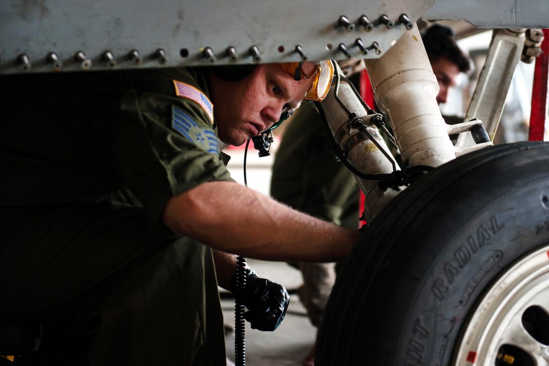 U.S. Air Force Staff Sgt. Matthew Lawson works to complete a 400-hour phase inspection on an F-16 Fighting Falcon aircraft at Bagram Airfield, Afghanistan, Oct. 18, 2015. Lawson is assigned to the 455th Expeditionary Maintenance Squadron. U.S. Air Force photo by Tech. Sgt. Joseph Swafford