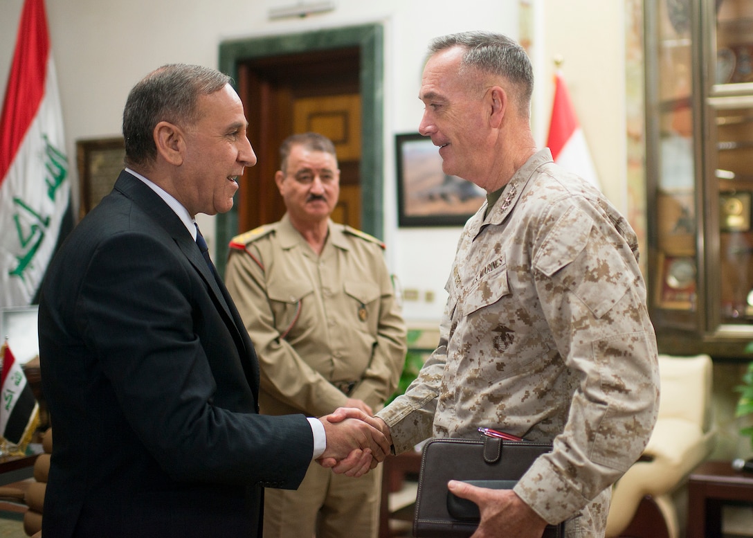 Iraqi Defense Minister Khaled al-Obaidi, left, meets with U.S. Marine Corps Gen. Joseph F. Dunford Jr., chairman of the Joint Chiefs of Staff, at the Iraq Ministry of Defense in Baghdad, Iraq, Oct. 20, 2015. DoD photo by D. Myles Cullen