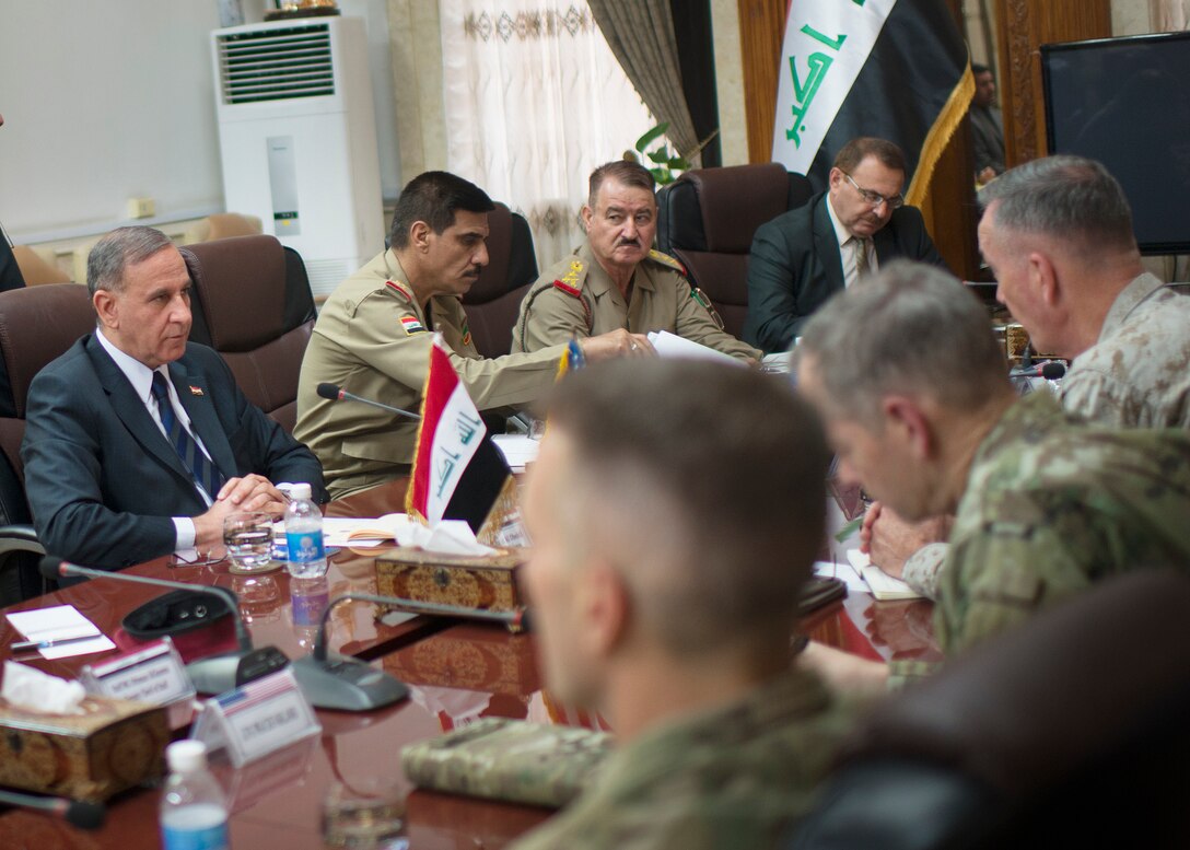 Iraqi Defense Minister Khaled al-Obaidi, left, meets with U.S. Marine Corps Gen. Joseph F. Dunford Jr., chairman of the Joint Chiefs of Staff, at the Iraq Defense Ministry in Baghdad, Iraq, Oct. 20, 2015. DoD photo by D. Myles Cullen