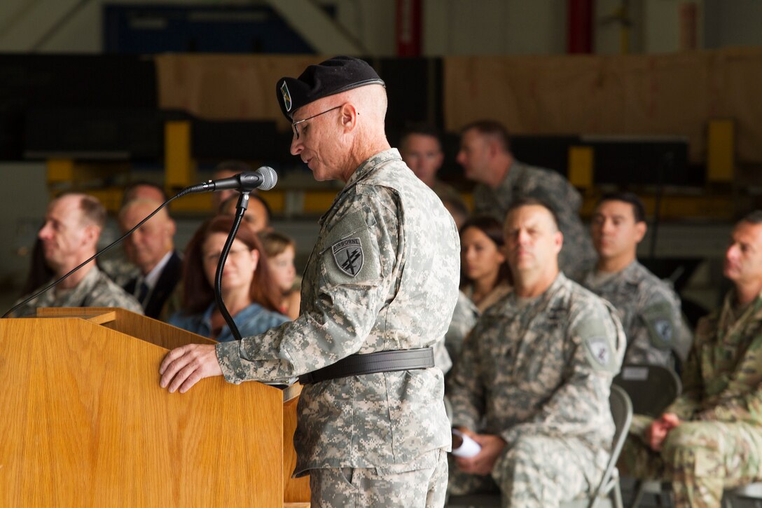 Army Reserve Brig. Gen. William Barriage, the commanding general of the 351st Civil Affairs Command, talks to Soldiers, families and friends during the Change of Responsibility Ceremony held at Moffett Field, Calif., Oct. 17. Command Sgt. Maj. Gregory Thomsen took the helm as the senior enlisted Soldier from Command Sgt. Maj. Mark Martello. The 351st CACOM has more than 2,100 Soldiers in eight states, to include Hawaii. The 351st CACOM is assigned to the U.S. Army Civil Affairs and Psychological Operations Command (Airborne) based at Fort Bragg, N.C. USACAPOC (A) has more than 13,000 Soldiers with Civil Affairs, Psychological Operations and Information Operations units across the country. USACAPOC(A) has 94 percent of the Army’s General Purpose Forces’ CA Capability, 100 percent of the Army’s General Purpose Forces’ PSYOP Capability and 42 percent of the Army’s General Purpose Forces’ I/O Capability. The command also has oversight of all Army Reserve airborne operations.