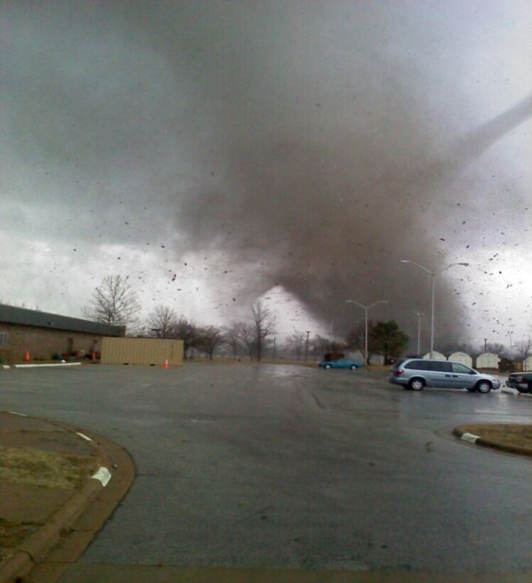 Extensive damage documented by the 88th Regional Support Command of Equipment Concentration Site – 66 at Fort Leonard Wood, Mo., after being struck by a tornado on Dec. 31, 2010. Continuity of Operation Plans allow the 88th RSC to maintain mission essential functions in this type of emergency. In order to be prepared for future emergencies, the 88th RSC’s Crisis Action Team members conducted a Continuity of Operations Plan Exercise on Ft. McCoy, Wis., Oct.14. Charles Hudson, 88th Regional Support Command chief of staff said he knows firsthand how important it is to have a COOP in place in the event of a natural disaster.

“The COOP’s priority of effort is to ensure mission essential functions are met,” Hudson said, “and then to ensure minimum degradation of customer support to commands within the 88th RSC geographic area of responsibility.” “The ability to implement the COOP was instrumental to recovery operations at Equipment Concentration Site – 66 at Fort Leonard Wood when it was struck by a tornado on December 31st, 2010,” Hudson explained. “Fortunately this was a federal holiday or we would have experienced loss of life.  As it was, we lost $2.7M in equipment destroyed, $3.4M in equipment damage, and $5.5M in facilities repair and replacement,” Hudson continued. “We accounted for 100 percent of ECS personnel that day, none were impacted personally, and most were called in to work over the weekend to secure equipment and facilities, account for property and begin the slow recovery process,” Hudson said. “It took nearly a year for ECS-66 to recover from this event and much of that time was spent operating in temporary facilities elsewhere on Fort Leonard Wood. In addition, warehouse operations had to move 140 miles to an available warehouse at Weldon Springs Local Training Area in Saint Charles, Mo., Hudson said. “Given this real-world scenario,” Hudson said, “a COOP for the 88th RSC Headquarters is very important.”