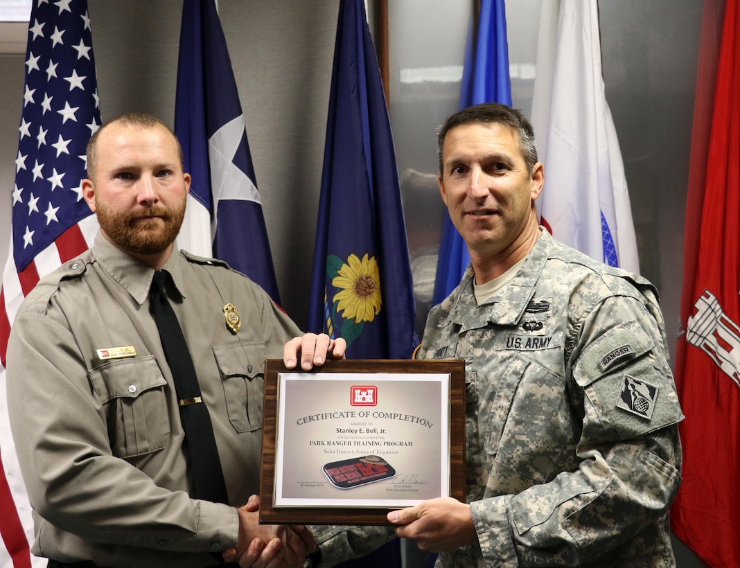 Ranger Stanley Bell recently completed the Park Ranger Training Course and received his graduation certificate from Col. Richard A. Pratt, Commander, Tulsa District, U.S. Army Corps of Engineers.

Bell served on active duty with the U.S. Army before coming to work for the Tulsa District.