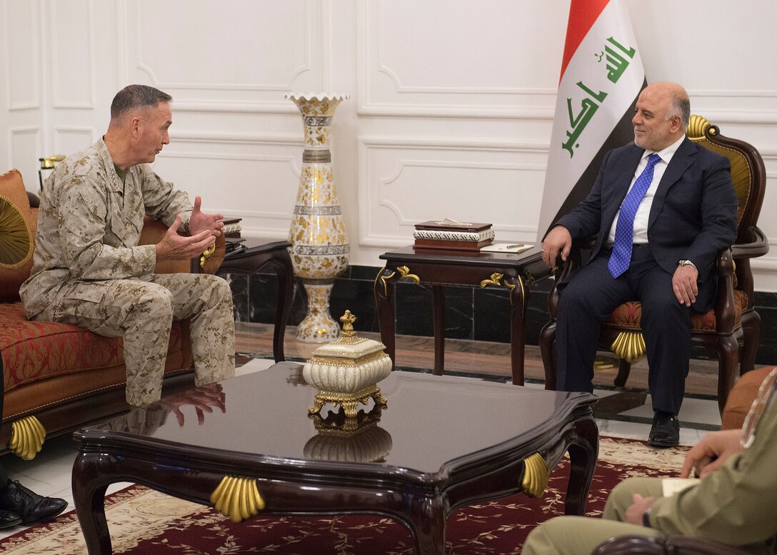 Iraqi Prime Minister Haider Jawed Kadhim Al-Abadi, right, meets with U.S. Marine Corps Gen. Joseph F. Dunford Jr., chairman of the Joint Chiefs of Staff, in Baghdad, Iraq, Oct. 20, 2015. DoD photo by D. Myles Cullen