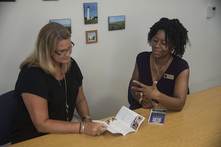 Angela Green (right), 902nd Force Support Squadron school liason officer, speaks with Kelly Lane, Joint Base San Antonio-Randolph Elementary School math instructional coach, Sept. 24 at JBSA-Randolph.
