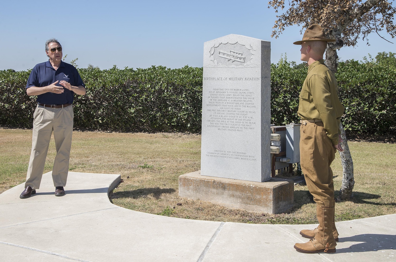 Rudy Purificato (left), Airmen Heritage Museum and Enlisted Character Development Center command curator, and Tech. Sgt. Adam Volpe, 320th Training Squadron military training instructor, explain the contributions of Lt. Benjamin Foulois to military aviation during an Air Education and Training Command Senior Leaders conference Oct. 14 at JBSA-Fort Sam Houston.  