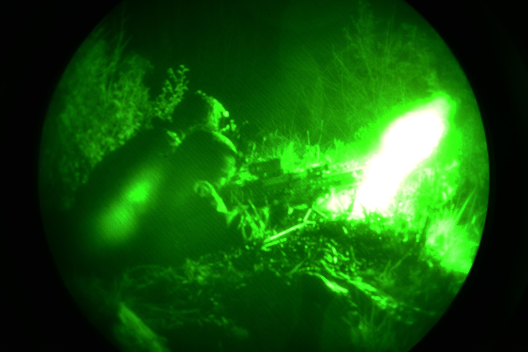 As seen through a night-vision device, U.S. paratroopers engage targets during a night live-fire exercise as part of Exercise Rock Proof V at Pocek Range in Postonja, Slovenia, Oct. 19, 2015. U.S. Army photo by Davide Dalla Massara