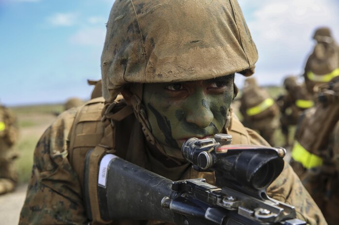 Private Alan E. Olivar, Bravo Company, 1st Recruit Training Battalion, is provides security after his squad found signs of a simulated improvised explosive device during the IED lane Crucible event,  at Marine Corps Base Camp Pendleton, Calif., Oct. 14. In July, Olivar arrived at Marine Corps Recruit Depot San Diego and became a part of Bravo Company. Following graduation from recruit training, Olivar will move onto the School of Infantry where he will continue to develop his combat skills. He will then attend school to become a motor transportation specialist. While he is active duty, he plans on helping his family and learning as much as he can. Today, all males recruited from west of the Mississippi are trained at MCRD San Diego. The depot is responsible for training more than 16,000 recruits annually. Bravo Company is scheduled to graduate from recruit training on Oct. 23.